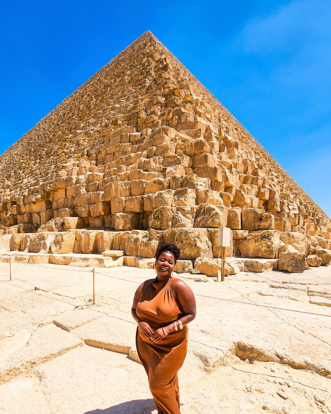 Thrifty Adventures traveller at the Pyramids of Giza on the August 2026 Egypt tour